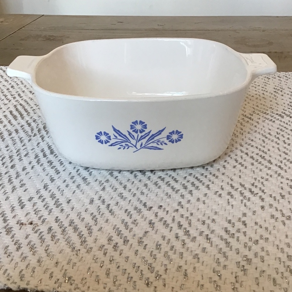 Vintage CorningWare casserole dish in the classic "Blue Cornflower" pattern.